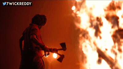 Man Holding Axe By Fire 7Wickreddy GIF