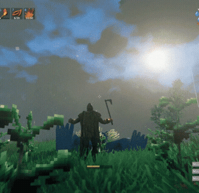 Man Holding Axe In Grass GIF