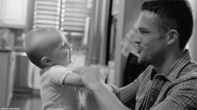 Man Holding Baby GIF