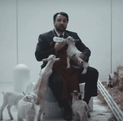 Man Holding Baby Goat Saying You Can't Take Them Yet GIF