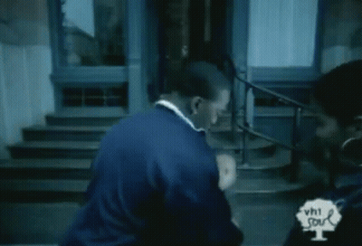 Man Holding Baby While Woman Watches GIF