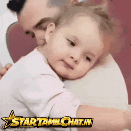 Man Holding Baby With Star Tamilchat.in Logo GIF