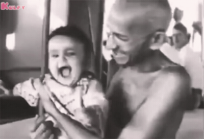Man Holding Baby GIF