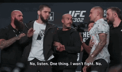 Man Holding Back His Self To Fight GIF