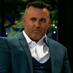 Man Holding Back His Self To React GIF