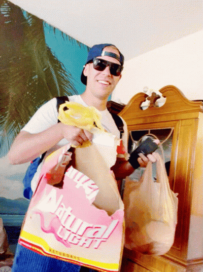 Man Holding Bag Saying Natural Light GIF