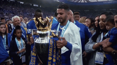 Man Holding Barclay's Trophy GIF