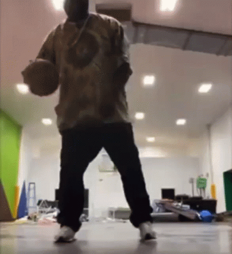 Man Holding Basketball GIF