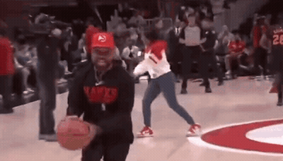 Man Holding Basketball Woman Defending GIF