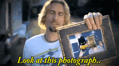 Man Holding Batman Duck Photo Saying Look At This Photograph GIF