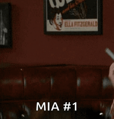 Man Holding Binder Says Mia #1 GIF