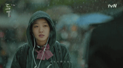 Man Holding Black Umbrella With TVN GIF