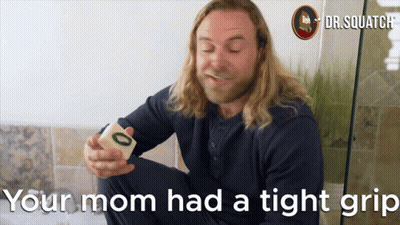 Man Holding Block Saying Your Mom Had A Tight Grip GIF