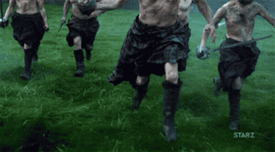 Man Holding Blue Flag With Letter G Walking GIF