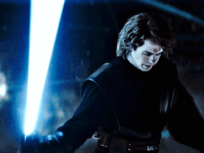 Man Holding Blue Lightsaber GIF