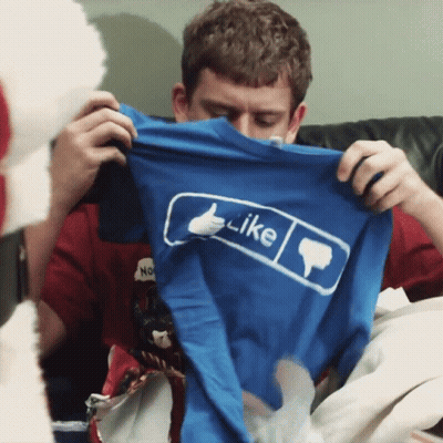 Man Holding Blue Shirt Saying Like GIF