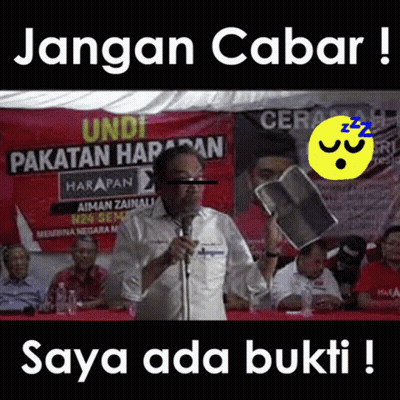Man Holding Book At Microphone Saying Jangan Cabar Saya Ada Bukti GIF