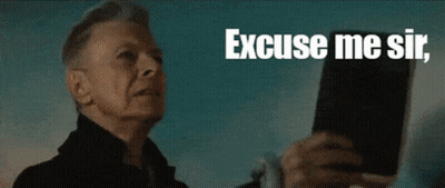 Man Holding Book Saying Excuse Me Sir GIF