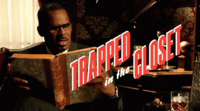 Man Holding Book Saying Trapped In The Closet GIF