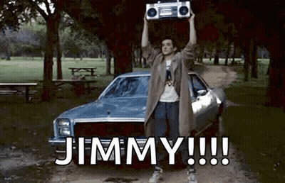 Man Holding Boombox Over Head GIF