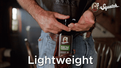 Man Holding Bottle Of Pine Tar GIF