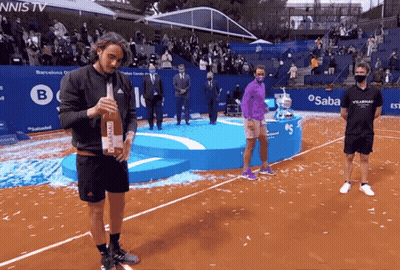 Man Holding Bottle Of Rosana Wine GIF
