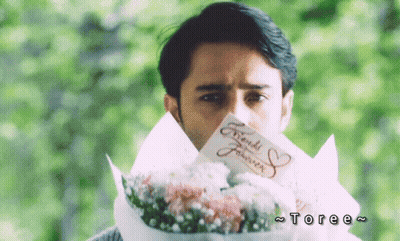 Man Holding Bouquet And Friends Forever Card GIF