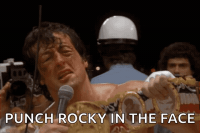 Man Holding Boxing Ring Saying Punch Rocky In The Face GIF