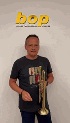Man Holding Brass Orchestra Instruments Notti Bop GIF