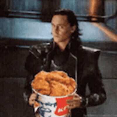 Man Holding Bucket Of Fried Chicken GIF