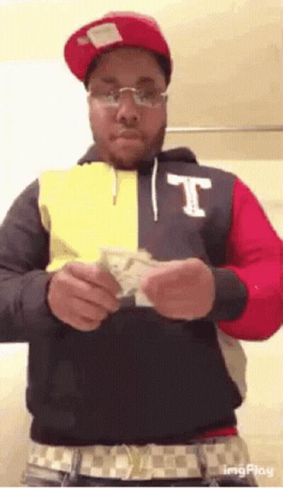 Man Holding Bunch Of Money GIF