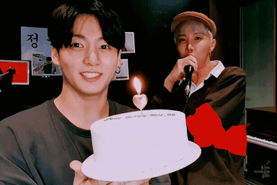 Man Holding Cake With Candle GIF