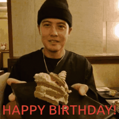 Man Holding Cake With Happy Birthday In Red GIF