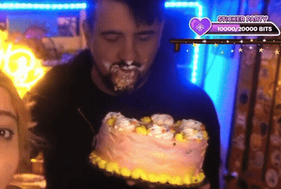 Man Holding Cake With Party Badge GIF