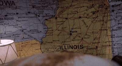 Man Holding Cappuccino In Front Of Illinois Map GIF
