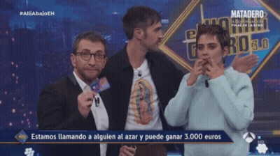 Man Holding Card Saying Estamos Llamando GIF