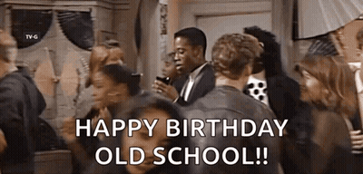 Man Holding Cell Phone In Group GIF