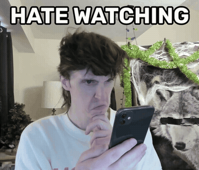 Man Holding Cell Phone Saying Hate Watching GIF