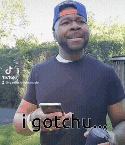 Man Holding Cell Phone Saying I Gotchu GIF