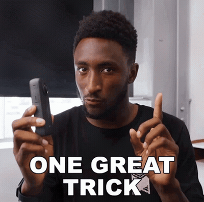 Man Holding Cell Phone Saying One Great Trick GIF