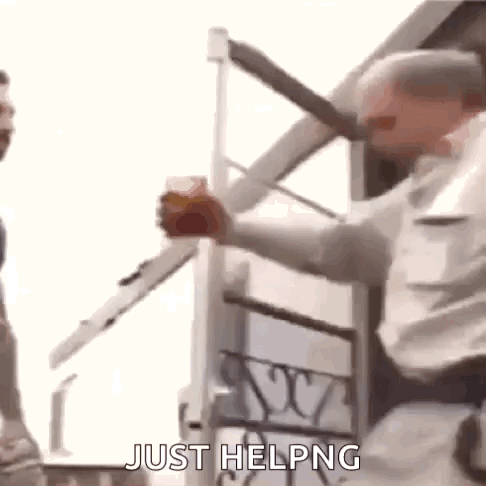 Man Holding Chainsaw And Sign Just Helping GIF