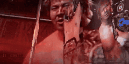 Man Holding Champion Sign GIF
