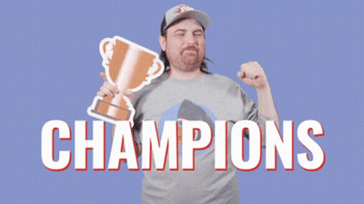 Man Holding Champions Trophy GIF