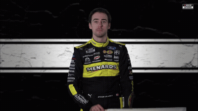 Man Holding Checkered Flag Saying Menards GIF