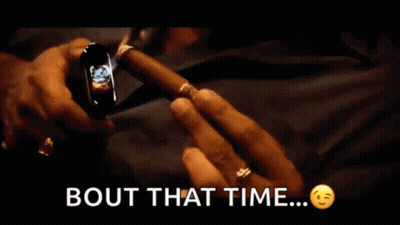Man Holding Cigar With Bout That Time GIF