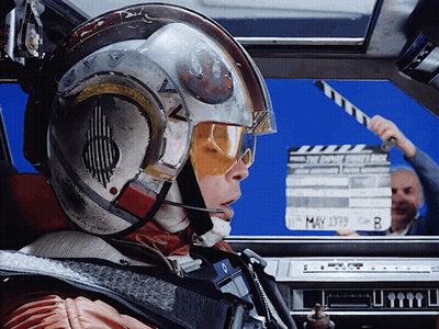 Man Holding Clapper Board May 1979 GIF