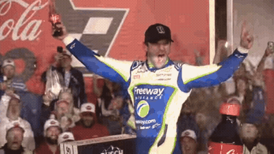 Man Holding Coca Cola Bottle Before Crowd GIF