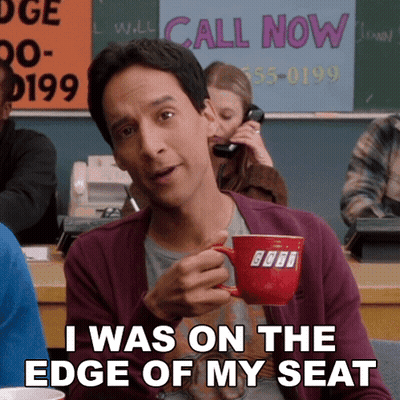 Man Holding Coffee Saying I Was On The Edge Of My Seat GIF