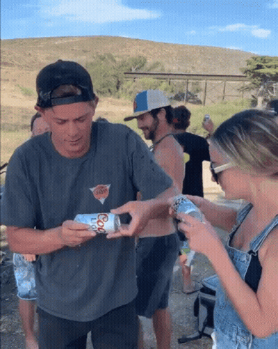 Man Holding Coors Light Can Woman Looking On GIF