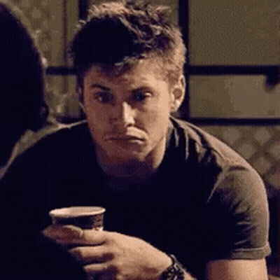 Man Holding Cup Of Coffee GIF